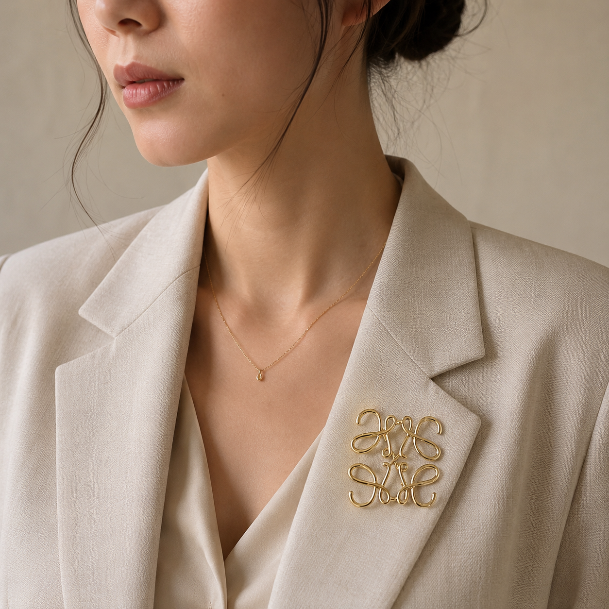 Gold Anagram-Inspired Brooch