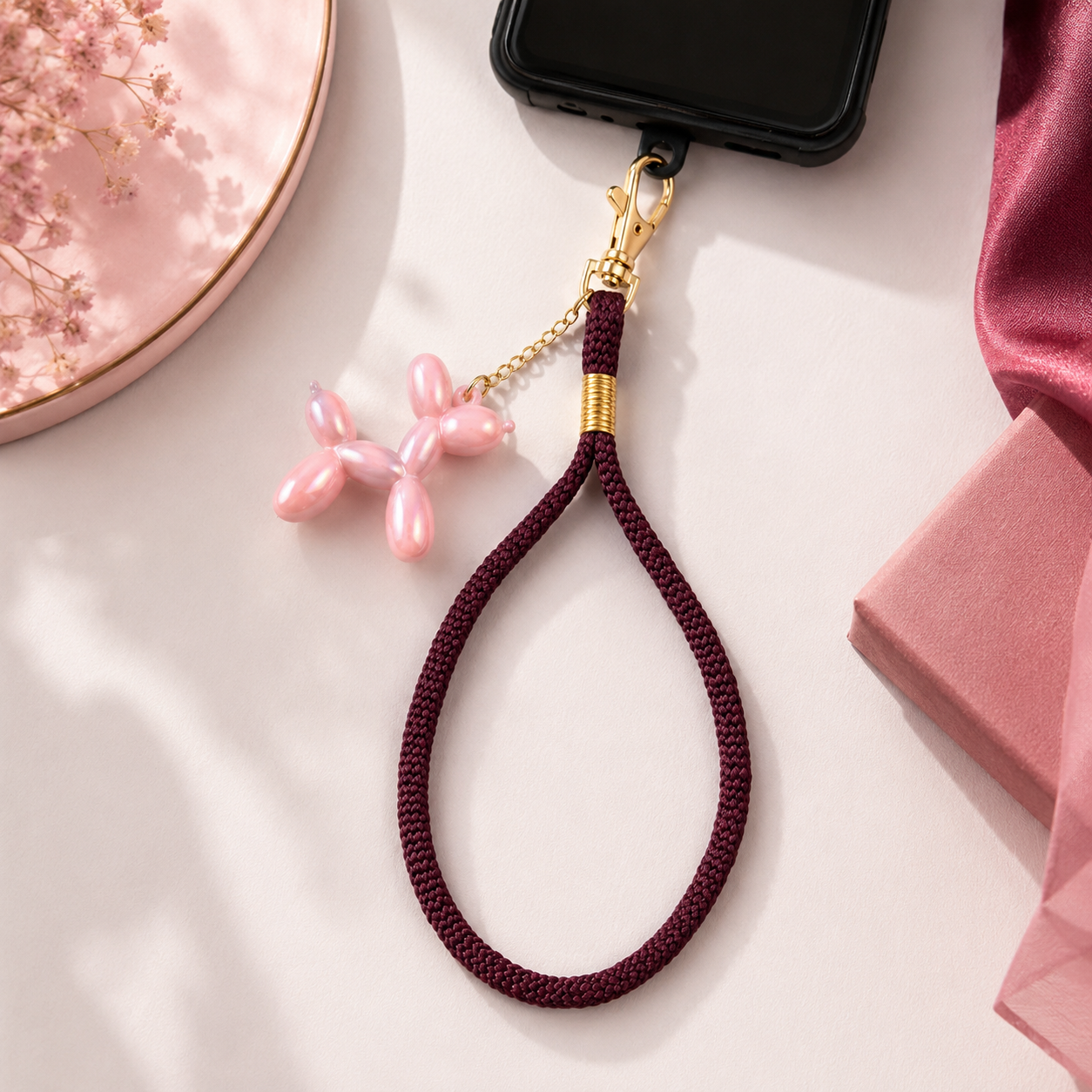 Burgundy Woven Wrist Mobile Strap with Pink Balloon Dog Charm