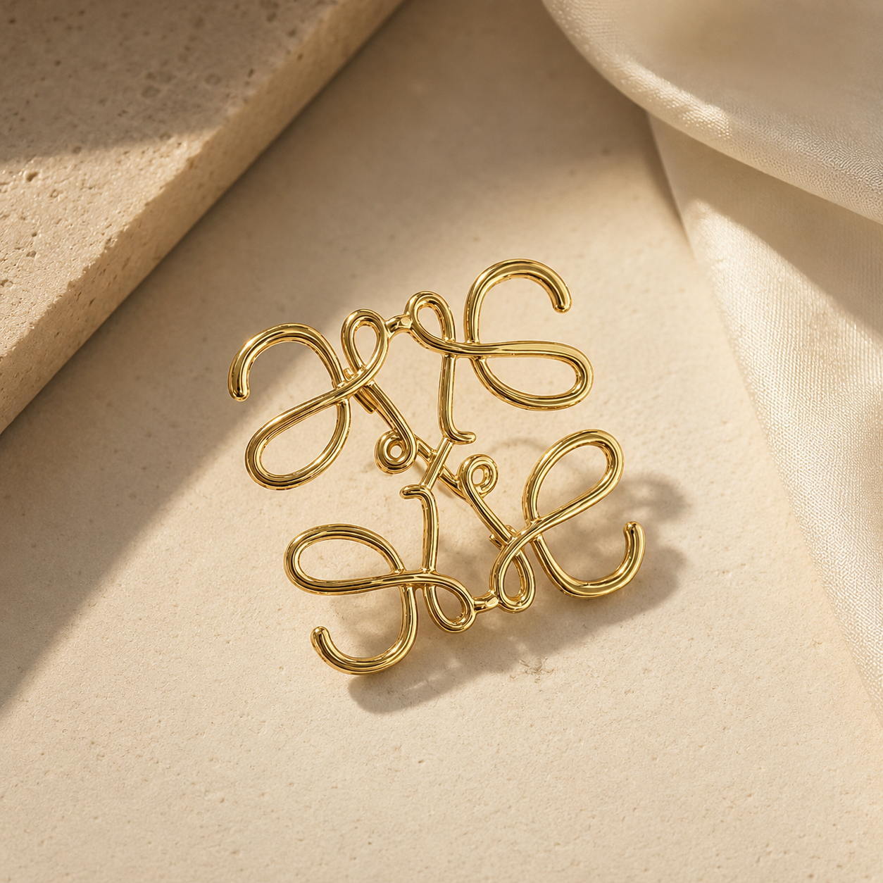 Gold Anagram-Inspired Brooch