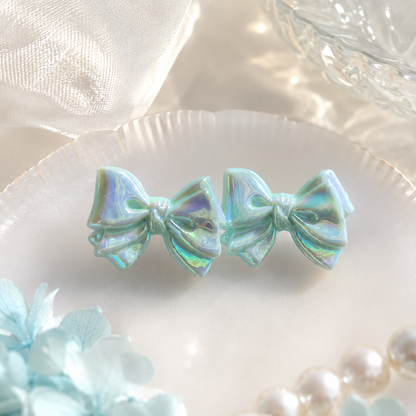 Light Blue Iridescent Acrylic Bow Earrings